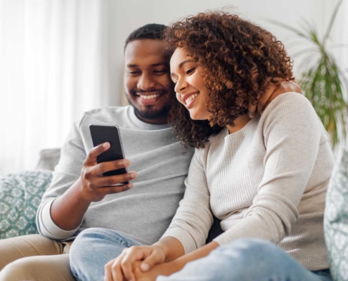 Residential Home Inspections couple looking at phone